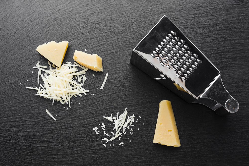 The right way to shred cheese with a cheese grater - Reviewed